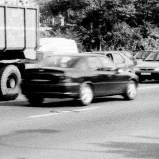 Busy urban intersection with heavy traffic.