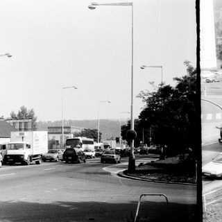 Busy urban intersection with heavy traffic.