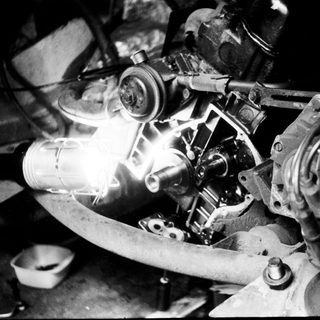 Vintage aircraft engine with exposed mechanical components.