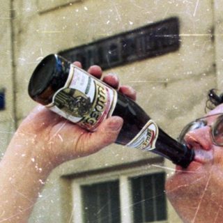 Celebratory beer drinking at Olympic event.