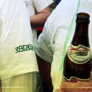 Celebratory beer drinking at Olympic event.
