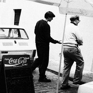 "Black-and-white street scene outside Pivnice Radegast beer hall."