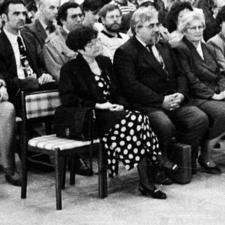 Formal lecture or meeting in auditorium setting.