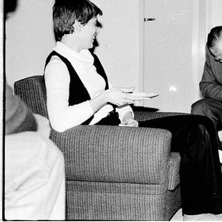 Family moment indoors with man, woman, and child.