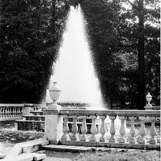 Elegant fountain with tall water jet.