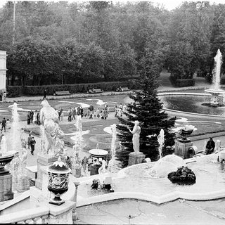Elegant historic park fountain with classical sculptures.