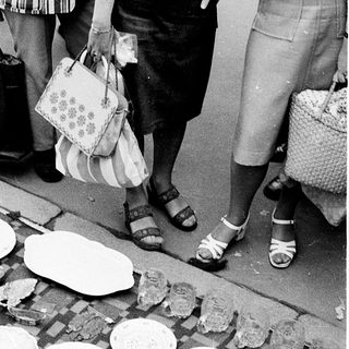 Street market selling secondhand or broken plates.