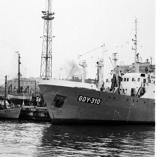 Maritime port with several ships docked.