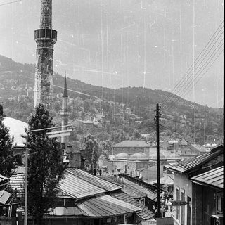 Historic town with minarets and traditional architecture.