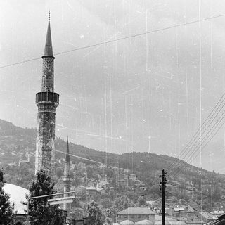 Historic town with minarets and traditional architecture.