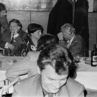 Group of men at a formal dinner gathering.