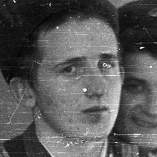 Two women in military uniforms, mid-20th century.