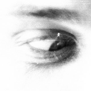 Close-up black-and-white portrait of a man.