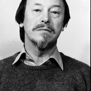 Portrait of a middle-aged man with beard and mustache.