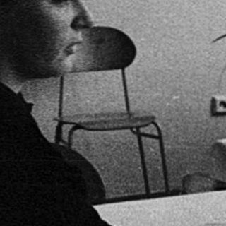 Four women studying or working together indoors.