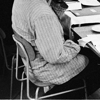 Classroom lecture with professor teaching students.