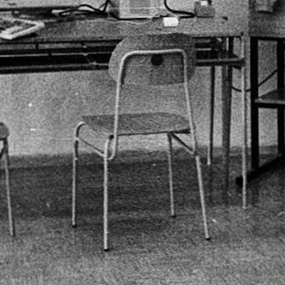 Business meeting with early computer demonstration.