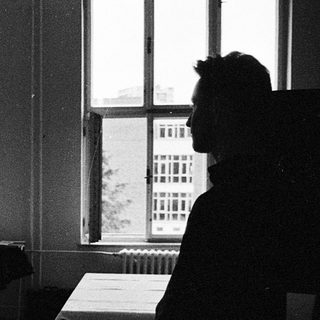 Classroom scene with students seated at desks.