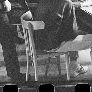 Classroom with students using early desktop computers.