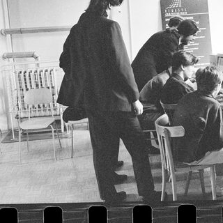 Classroom with students using early desktop computers.