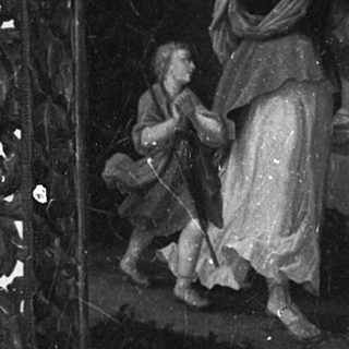 "Religious painting of angel and child in ornate frame."