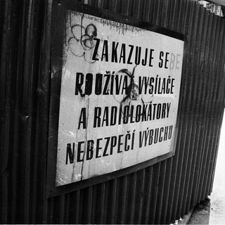 Warning sign prohibiting radio transmitters near nuclear facility.
