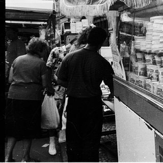 Street market stall warning about food poisoning risks.