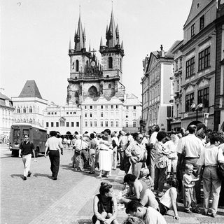 People gather near Prague's Church of Our Lady before Týn.