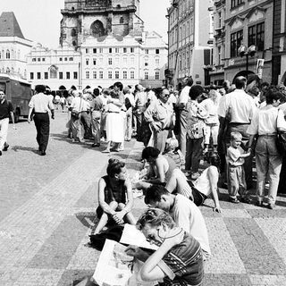 People gather near Prague's Church of Our Lady before Týn.
