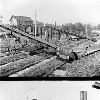 Damaged railway tracks and bridge collapse.