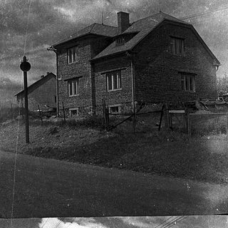 Two vintage photos of rural houses on elevated terrain.