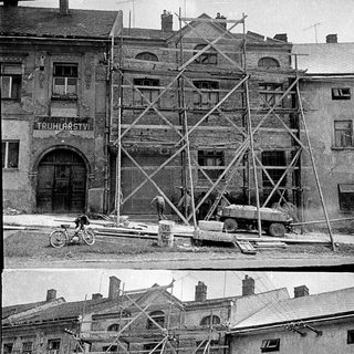 Restoration scaffolding on historic building facade.