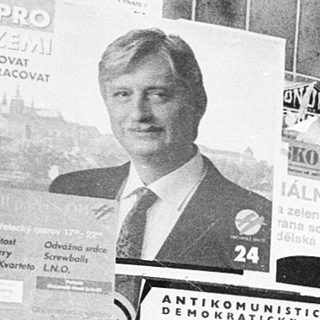 Political campaign posters and anti-communist slogans displayed.