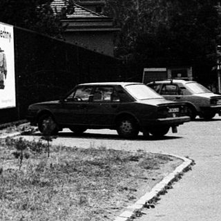 Political campaign posters near a club.