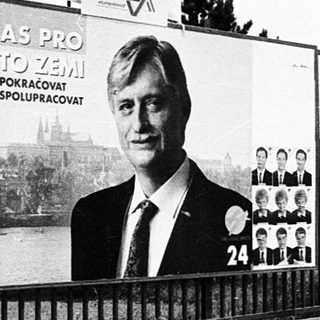 Political campaign posters near a club.