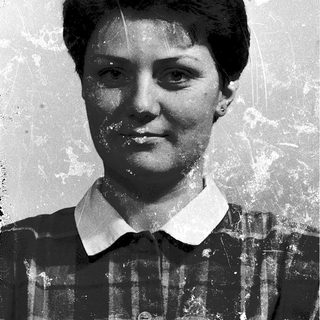Vintage black-and-white portrait of a woman.