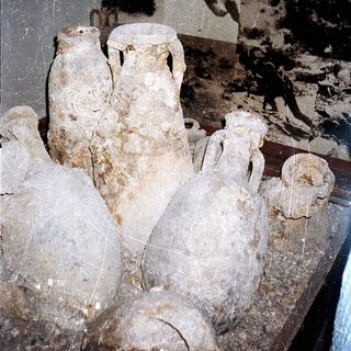 Ancient pottery fragments and broken clay artifacts.