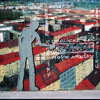Urban mural with graffiti text and silhouette.