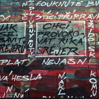 Graffiti on wall with Czech/Slovak political slogans.