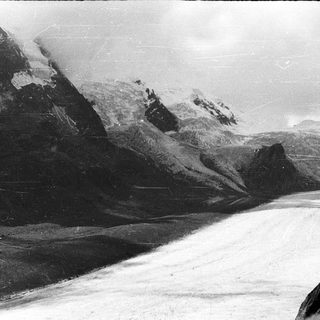 Majestic mountain glacier with rugged peaks.