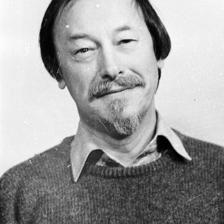 Black-and-white portrait of a middle-aged man with mustache.