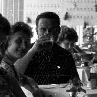 Group of women dining together indoors.