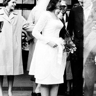 Wedding ceremony exit with bride and guests.