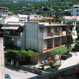 Mediterranean-style residential buildings with terraces.