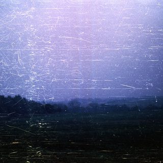 "Foggy landscape with faint horizontal light streaks."