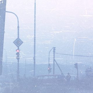 Hazy urban scene with heavy fog.