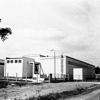 Industrial building complex with modernist architecture.