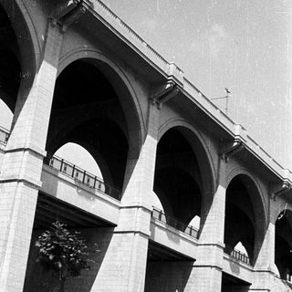 Elegant stone bridge with multiple arches.