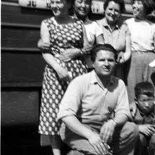 Family group portrait from mid-20th century.