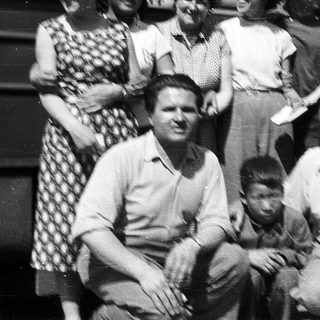 Family group portrait from mid-20th century.